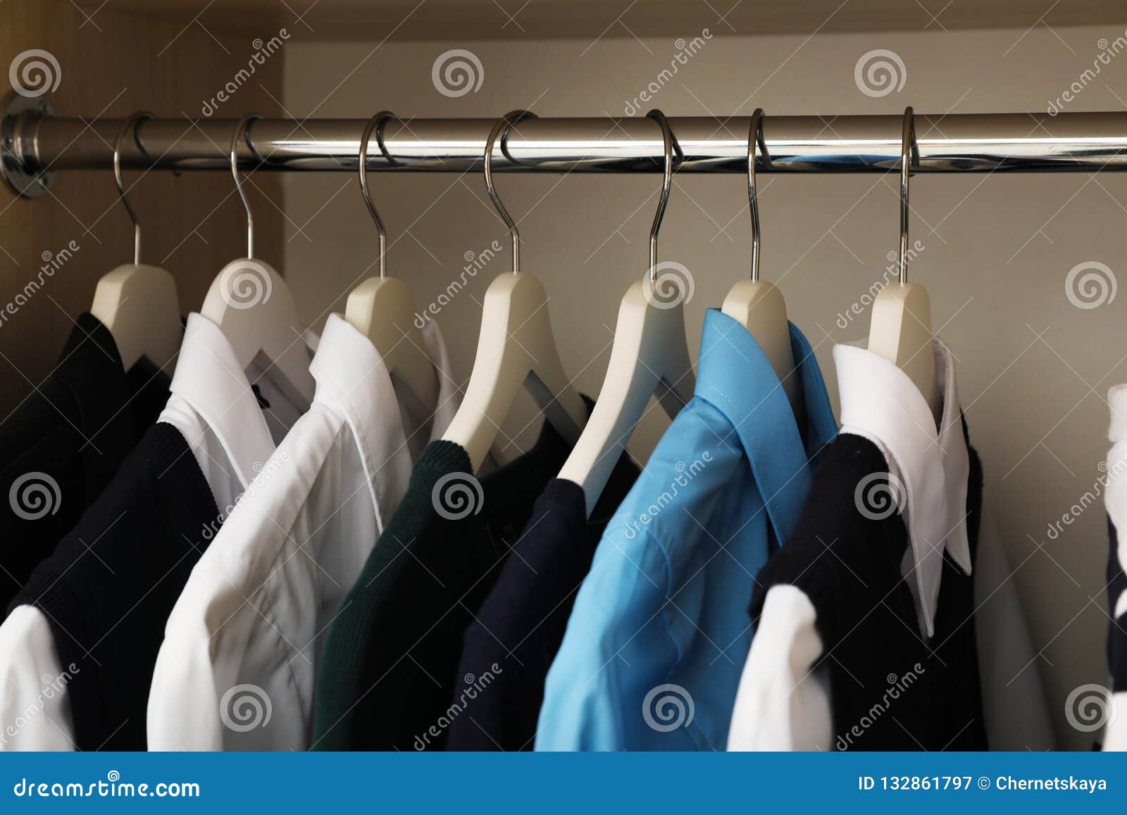 Hangers with Teenage Clothes on Rack in Wardrobe Stock Image - Image of ...