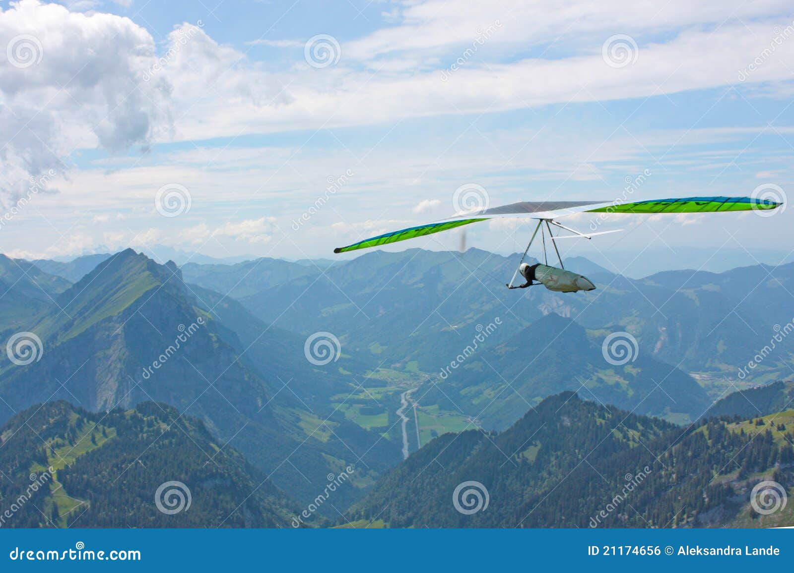 Hanggliding in Swiss Alps stock photo. Image of landscape 21174656