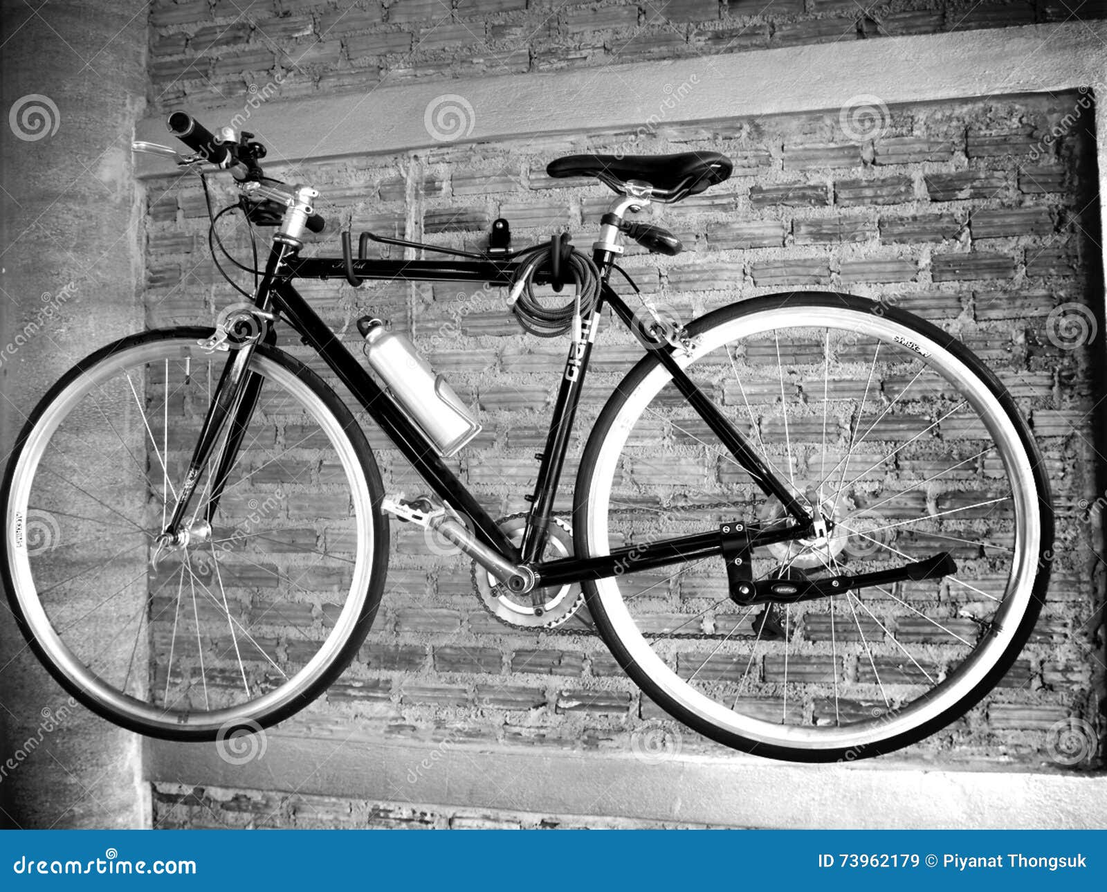 Hanging a bicycle editorial stock image. Image of hanging 73962179