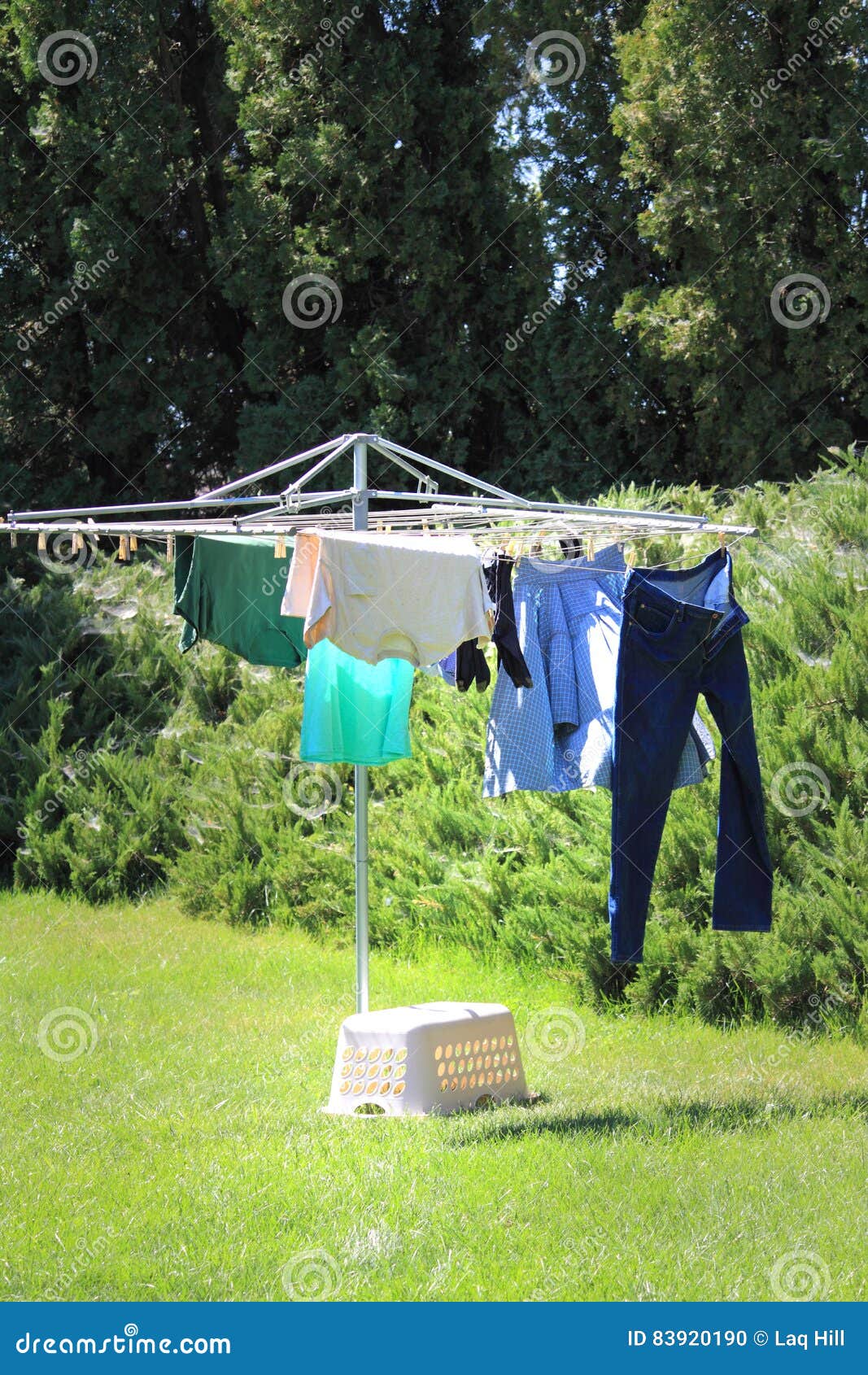 Hanging Clothes on a Line stock photo. Image of pinned - 83920190