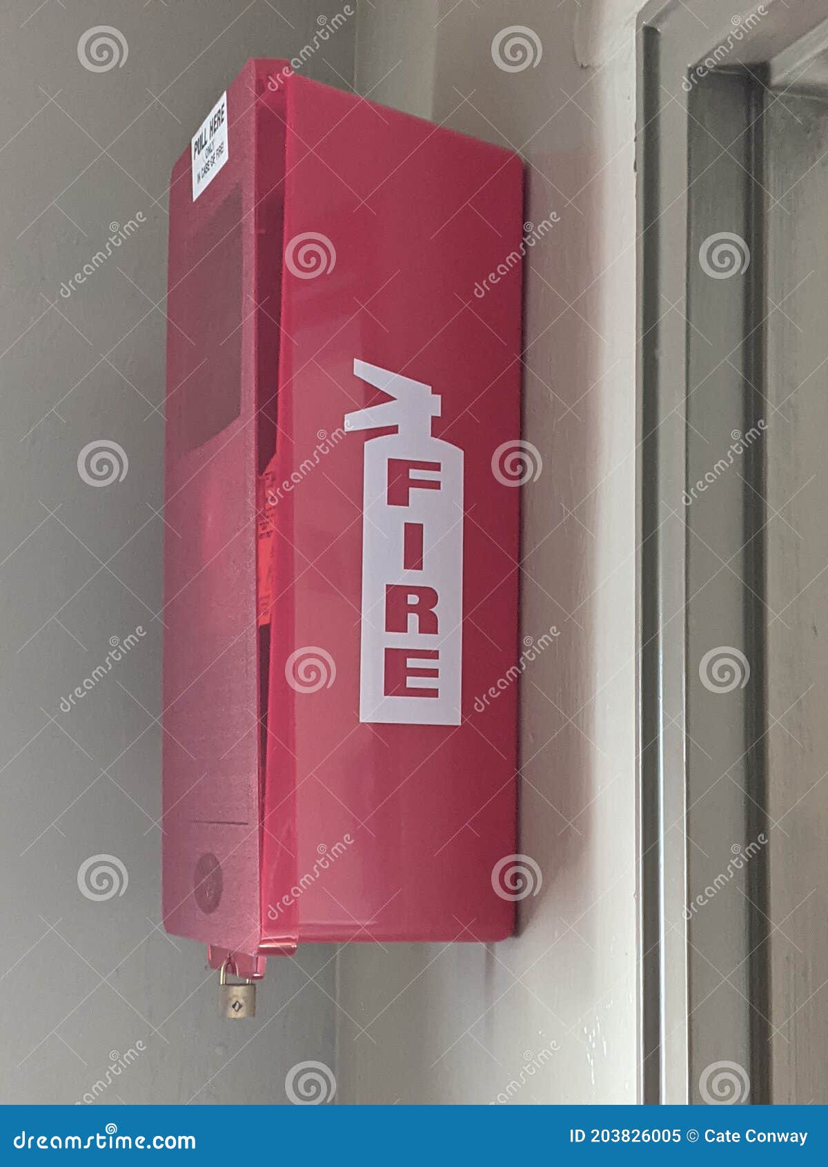 Hanging Fire Extinguisher on Wall Stock Image Image of number, design