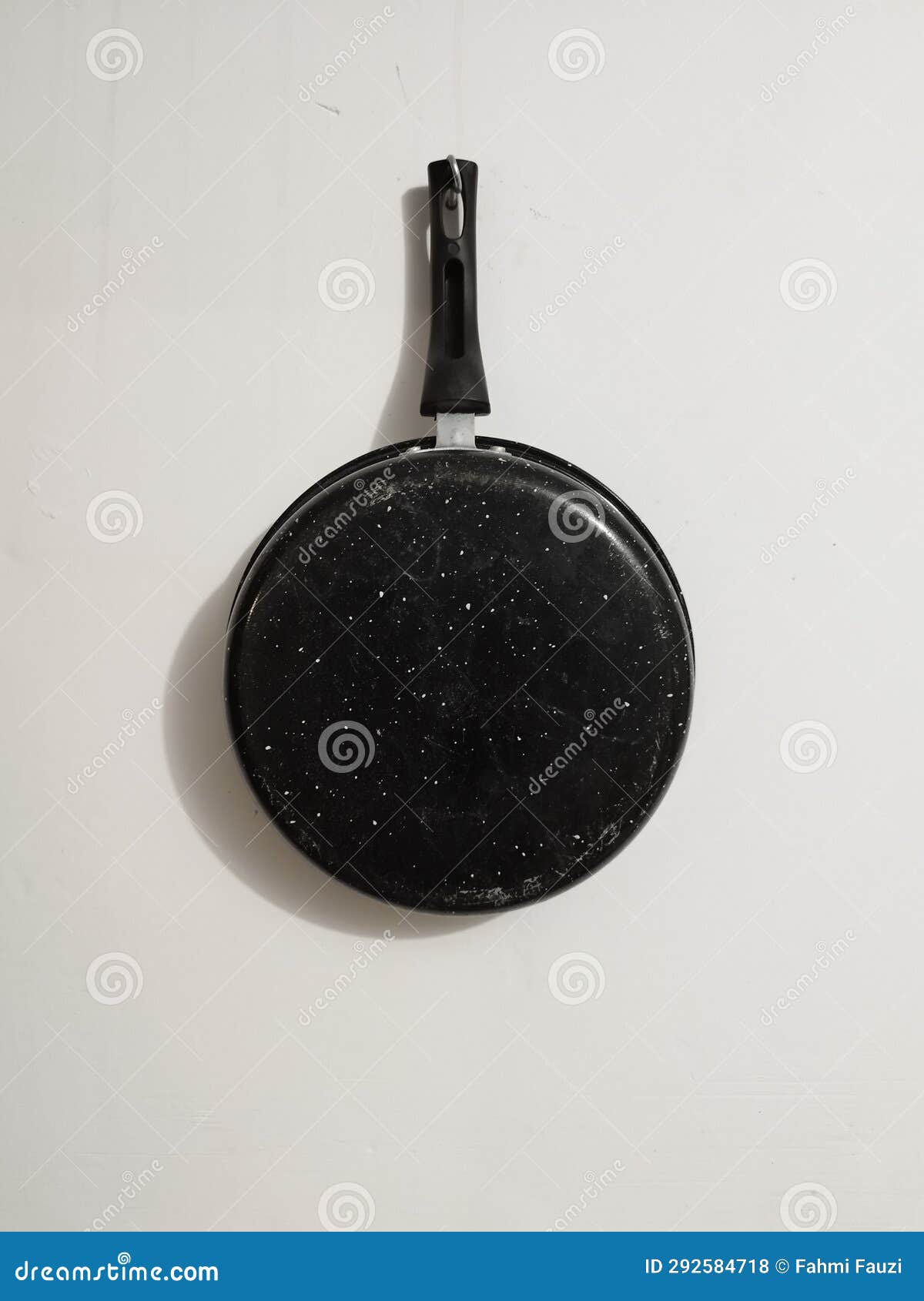 A hanging frying pan stock photo. Image of glass, metal 292584718