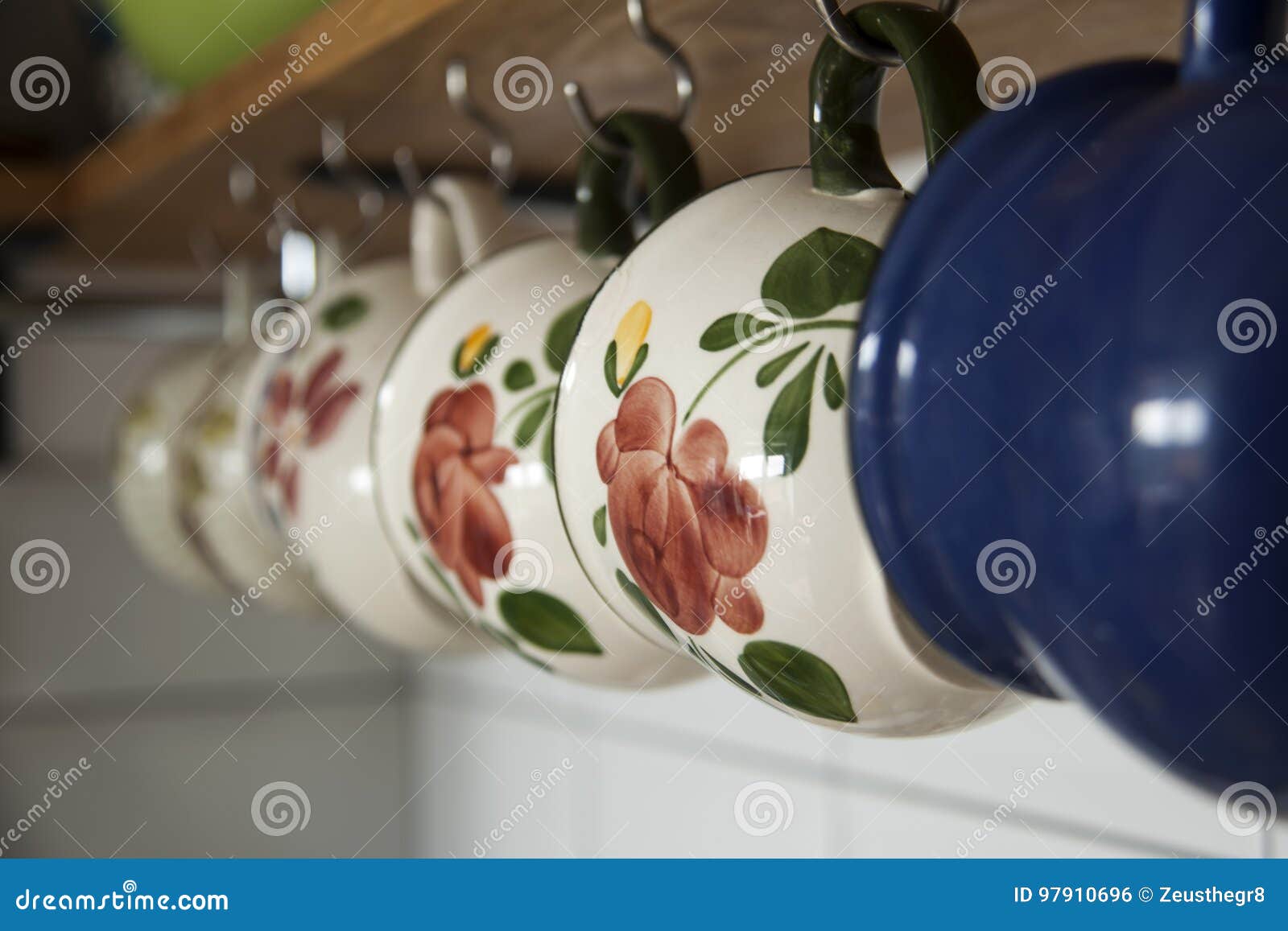 Hanging on Hooks Coffee Cups in Kitchen Stock Photo Image of