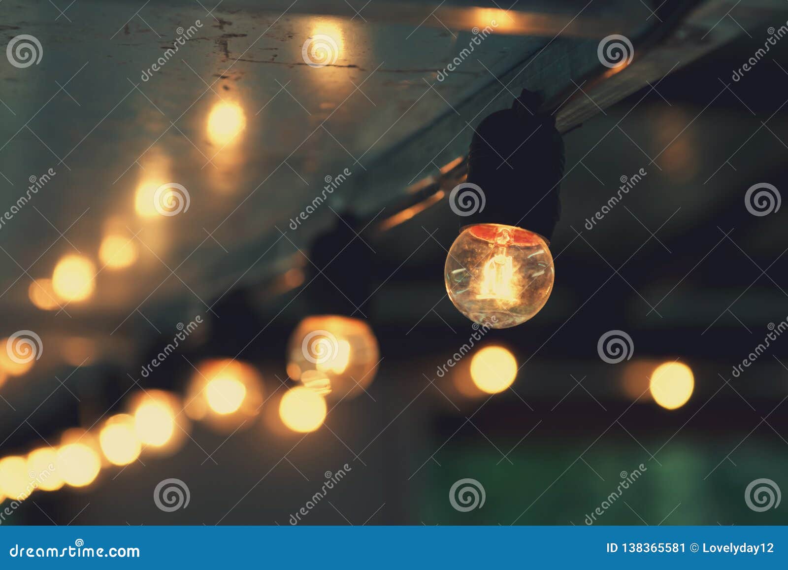 Hanging light bulb indoor stock image. Image of design 138365581