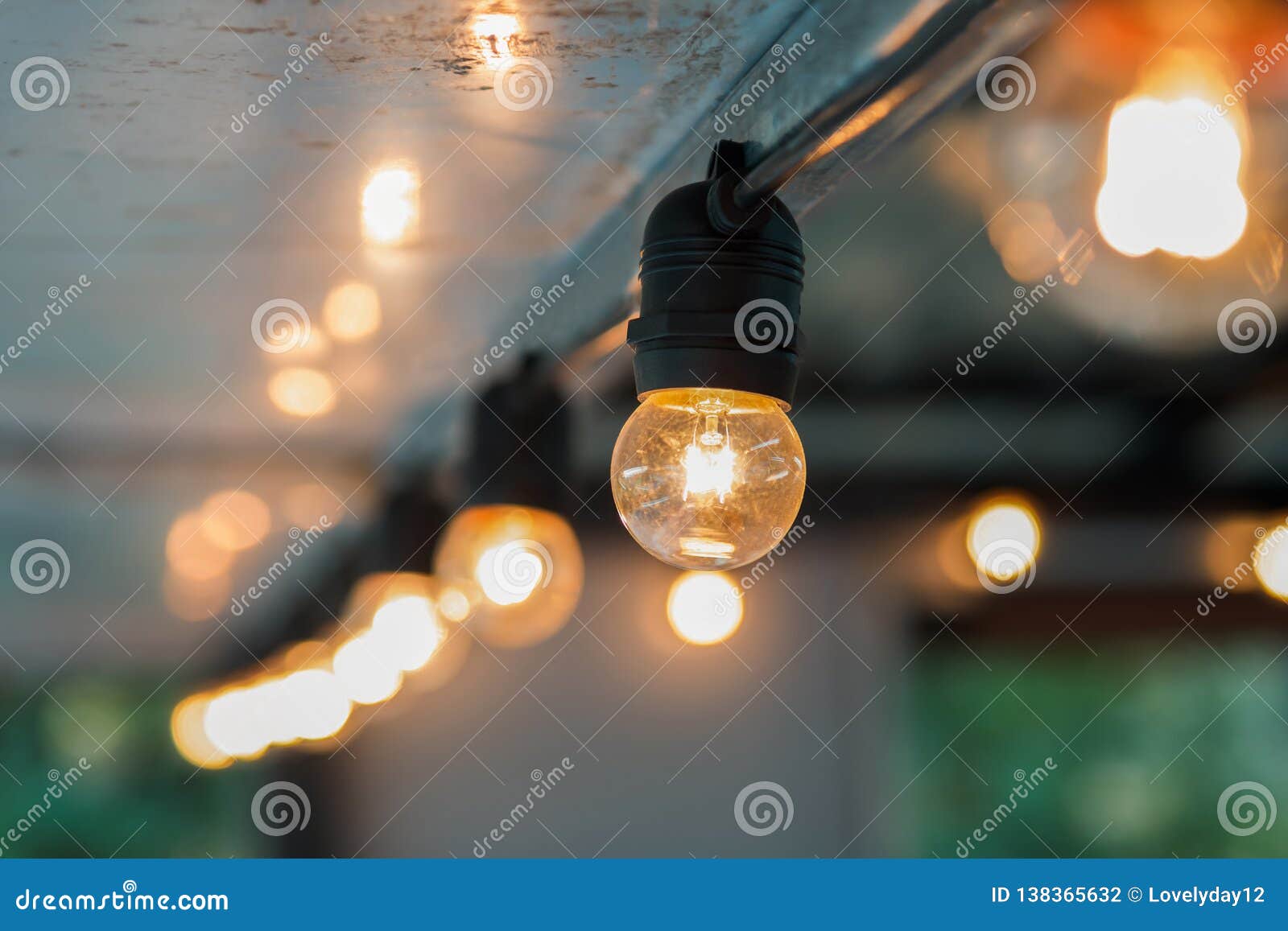 Hanging light bulb indoor stock photo. Image of shiny 138365632