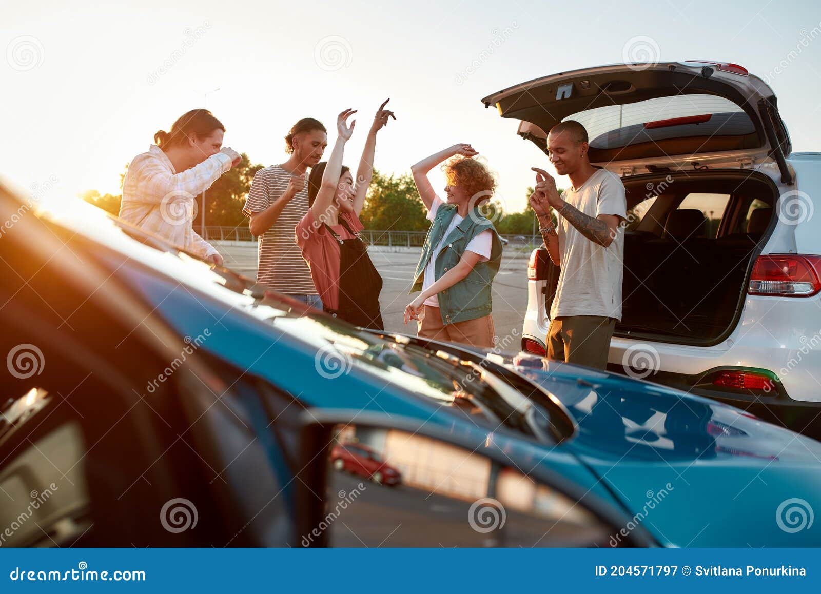 dancing outside the car