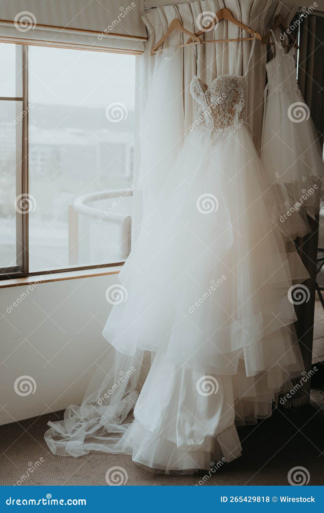 Hanging Wedding Dress in Room Stock Photo Image of textile, dress 265429818