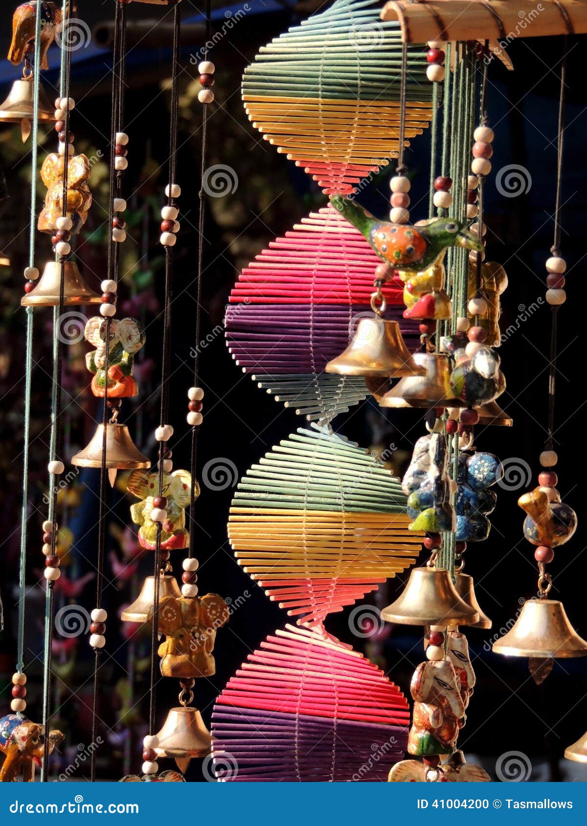 colorful wall hanging with bells