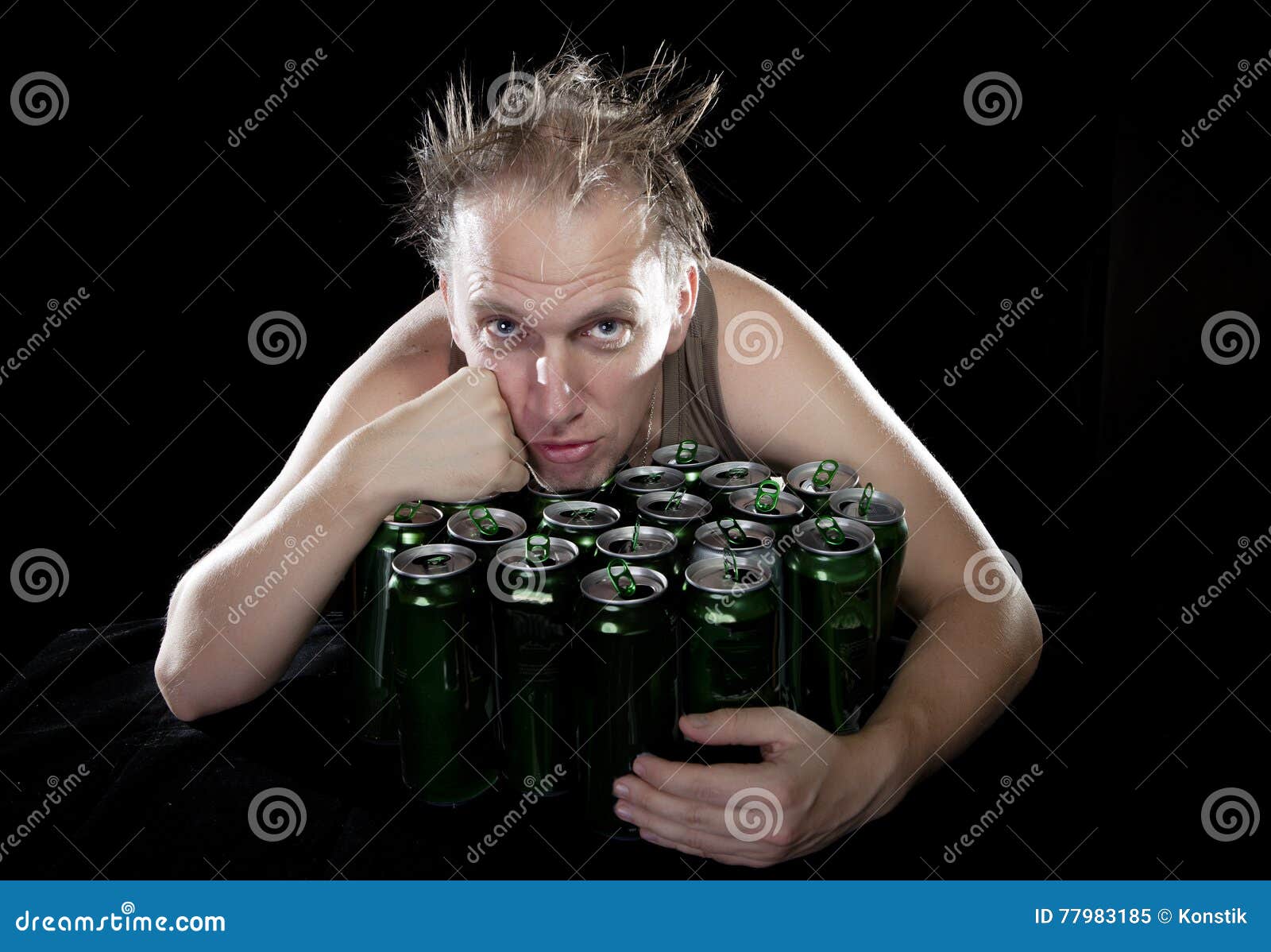 Hangover.the Drunk Man and is a Lot of Empty Beer Cans Stock Image