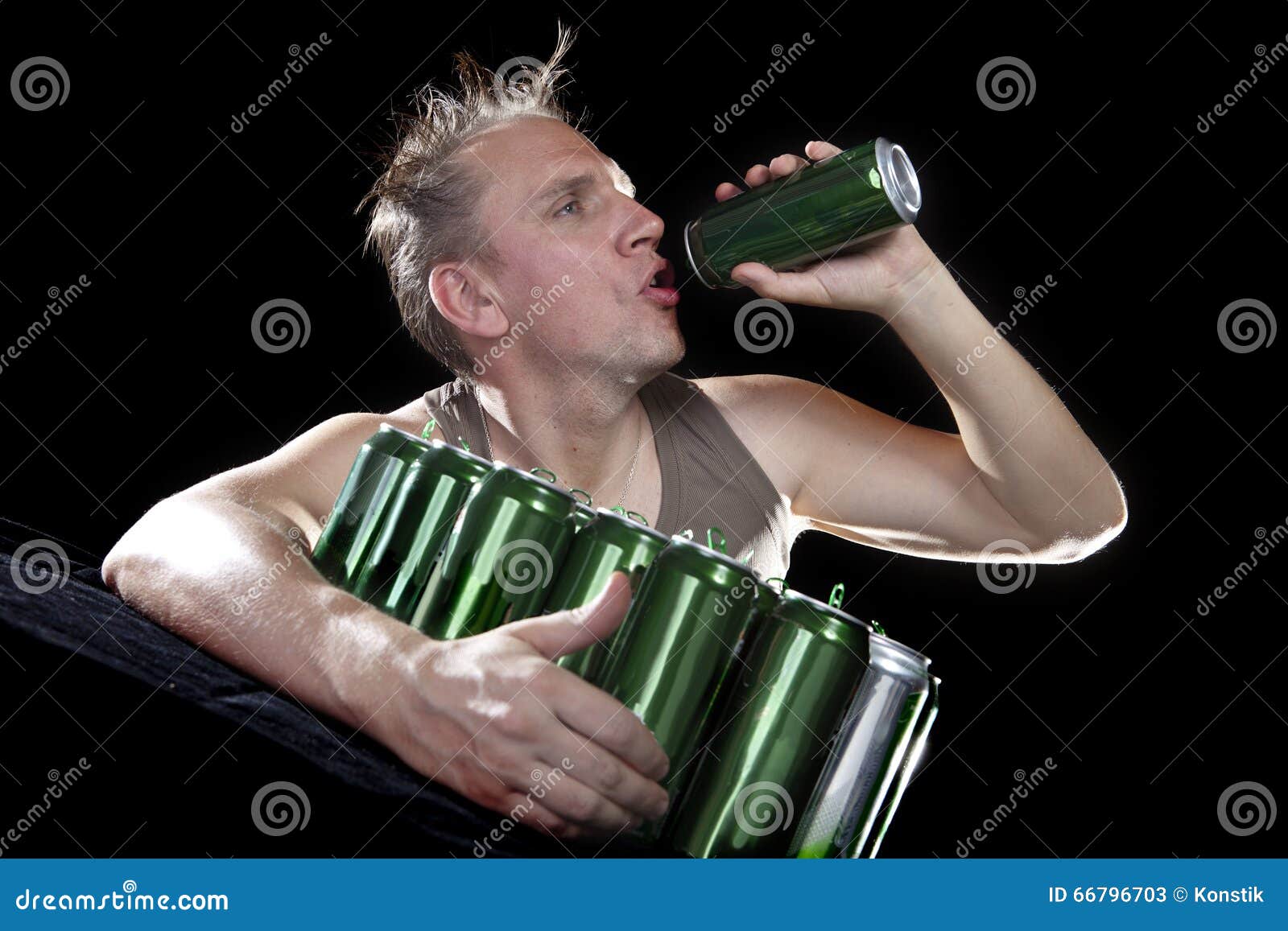 Hangover. the Man Examines, Whether There is No Beer Drop in a Can