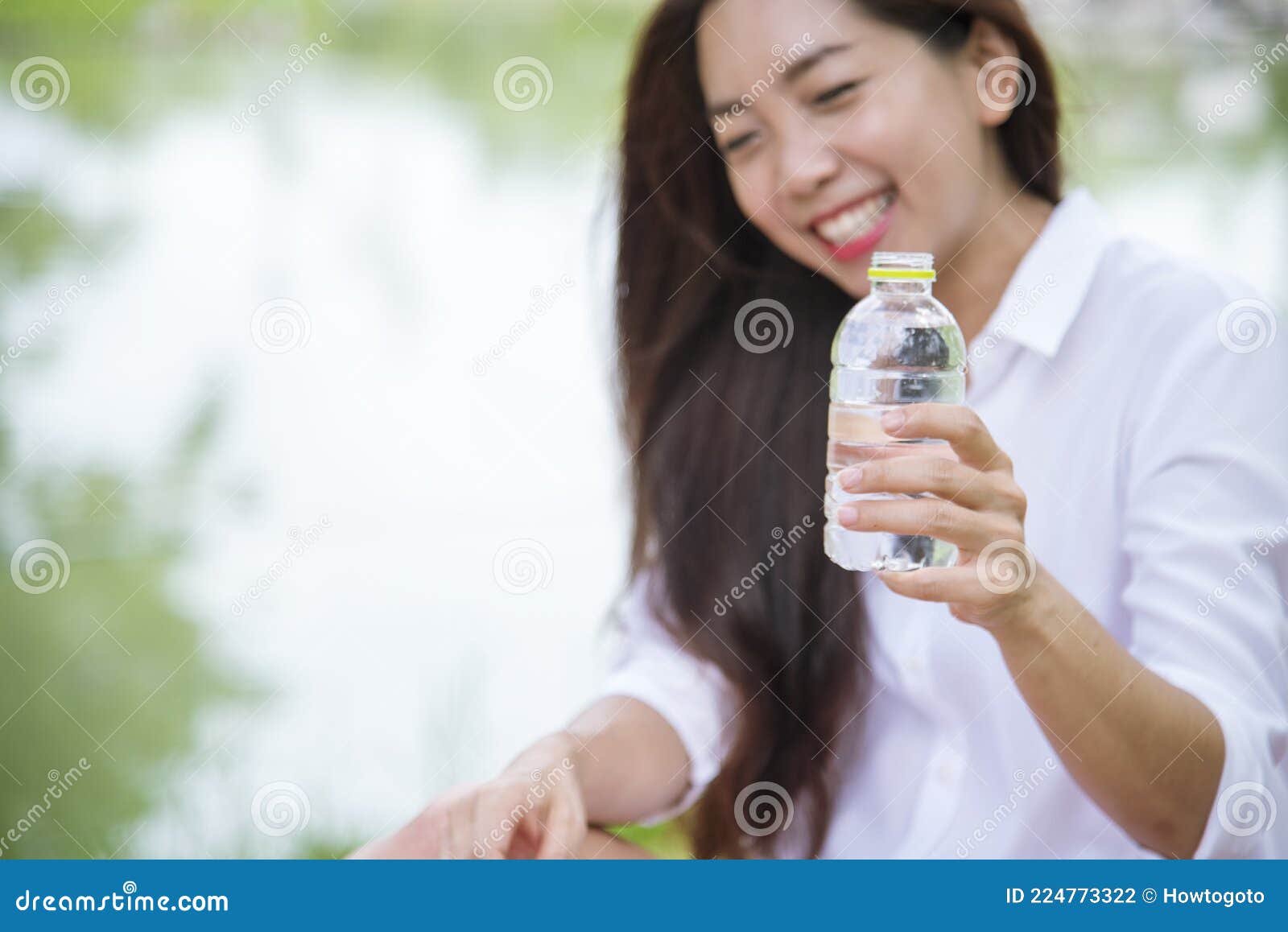 Woman drinking from water bottle Stock Photo by ©photography33 8689824