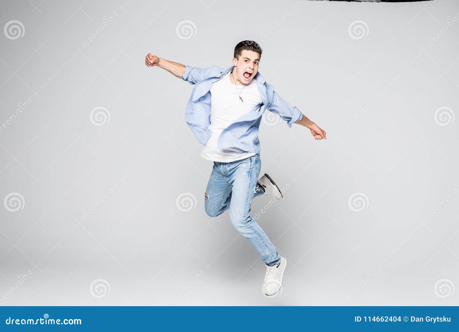 Happiness, Freedom, Movement and People Concept - Smiling Young Man ...