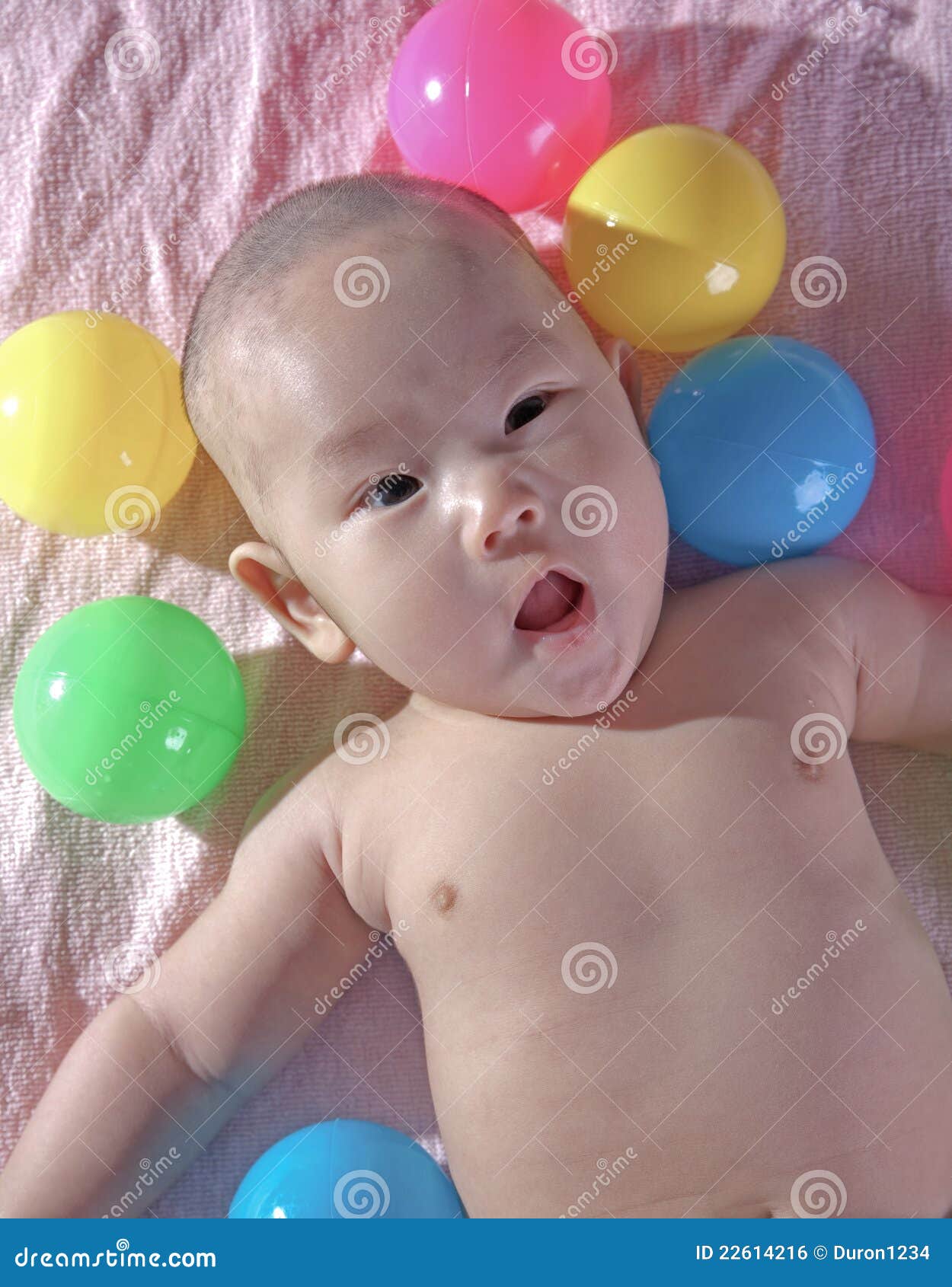 A Happy 3 Months Old Baby in a Bath of Balls Stock Photo Image of copy, cheerful 22614216