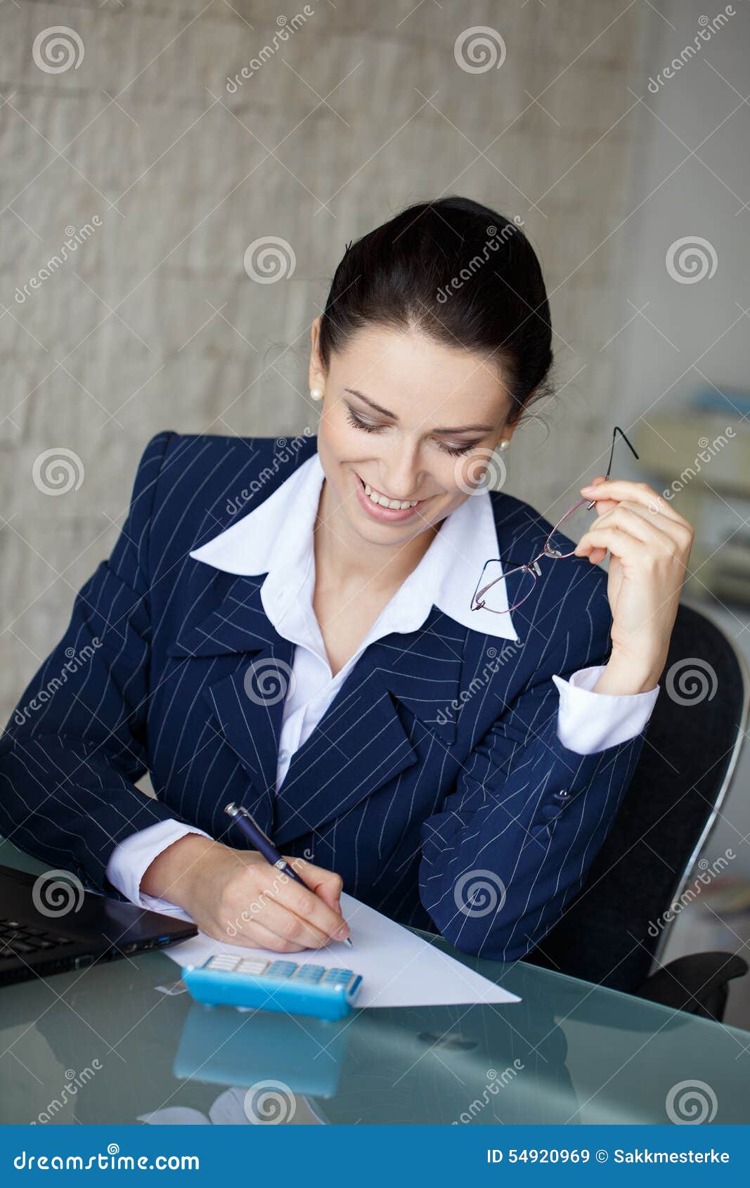 happy accountant write on blank paper