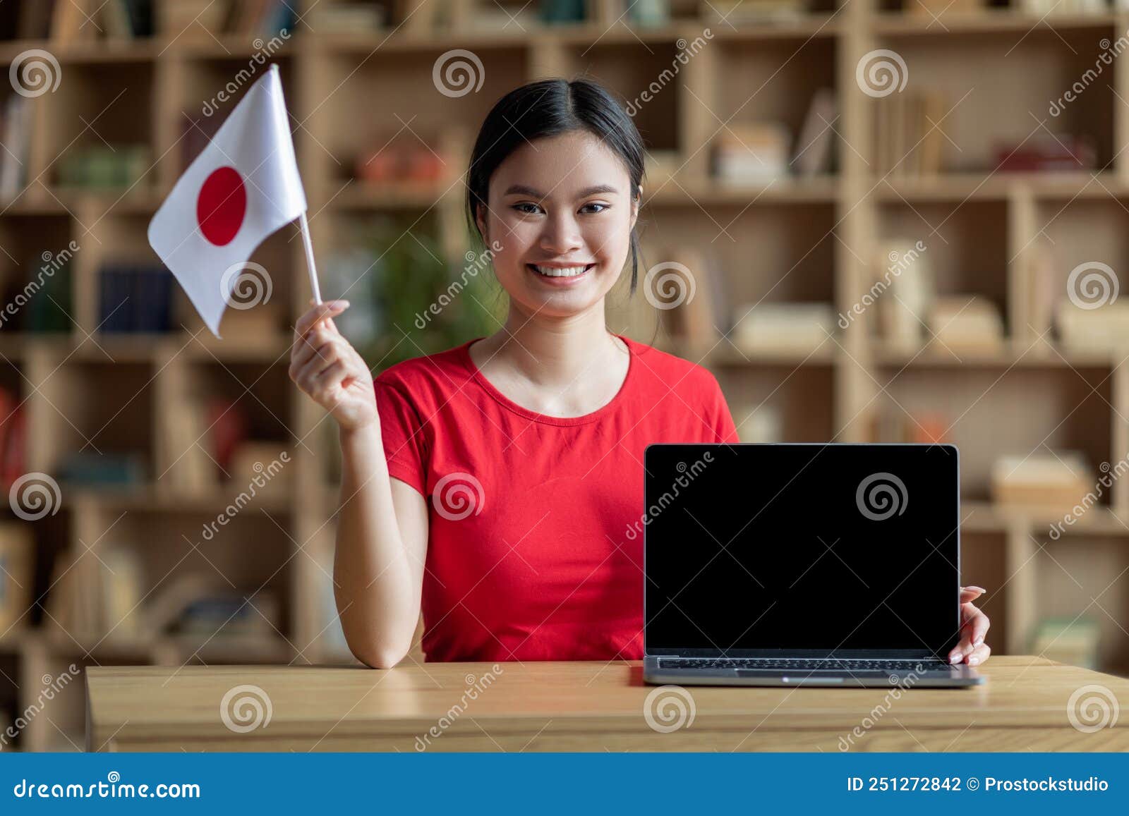 Positive japanese woman freelancer working from home, using gadgets Stock  Photo by Prostock-studio