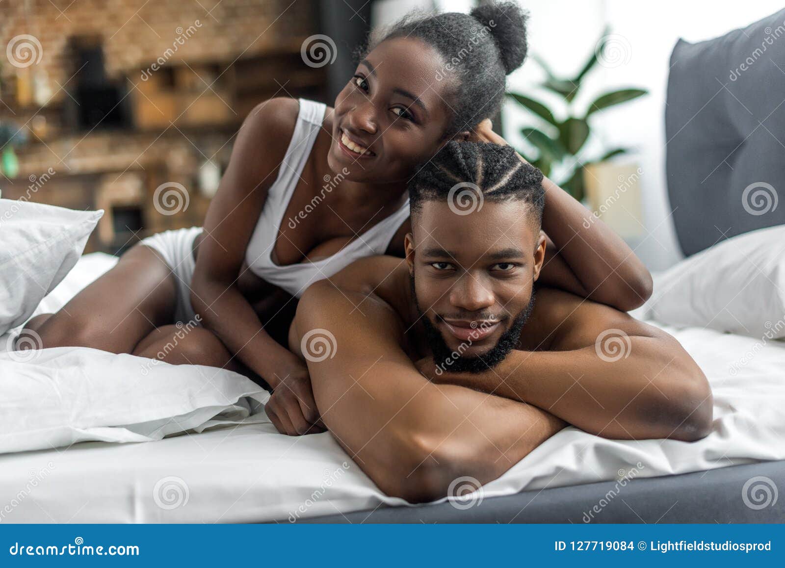 Happy African American Couple in Underwear Looking at Camera Stock