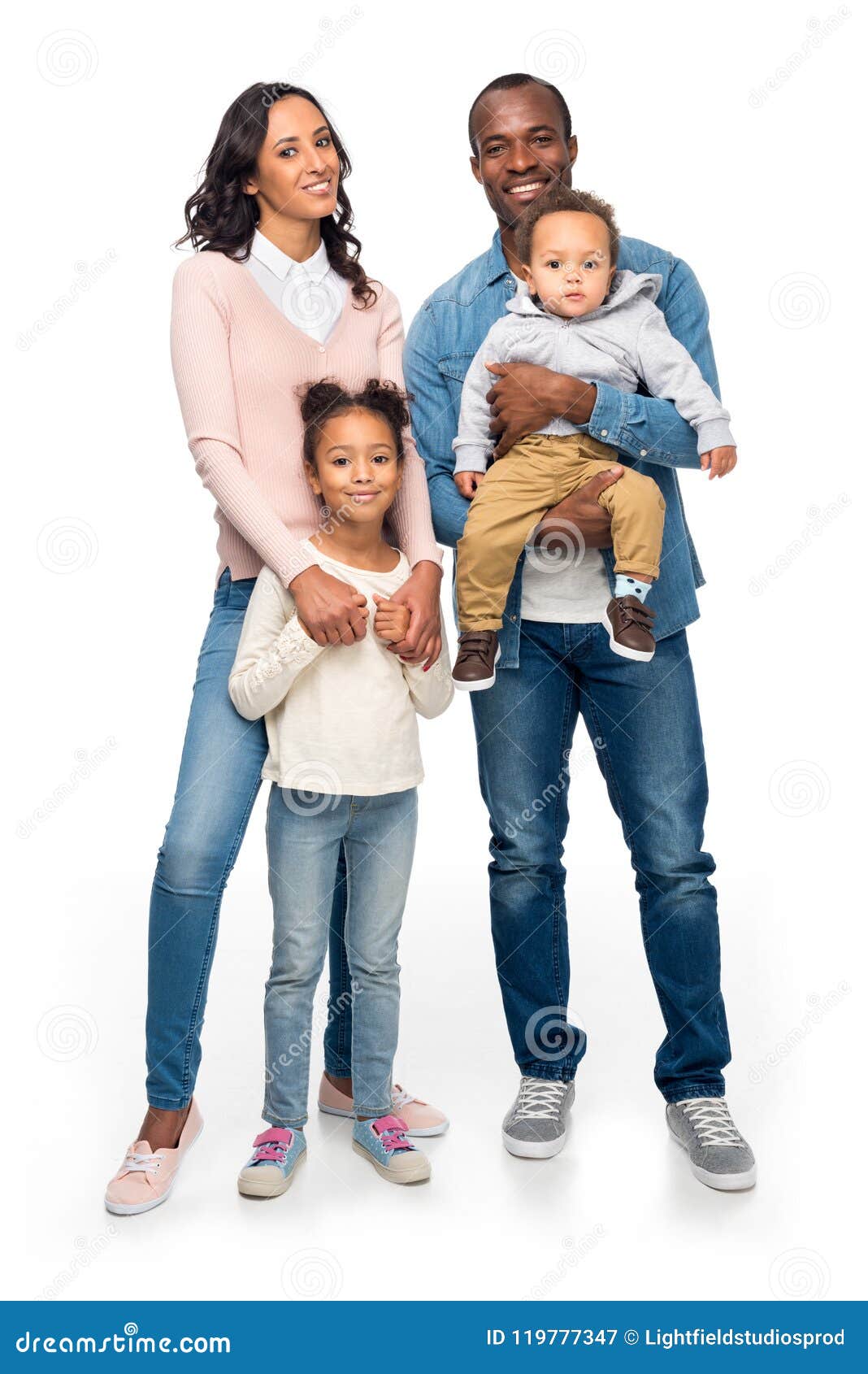 Happy African  American  Family  With Two Kids Standing  