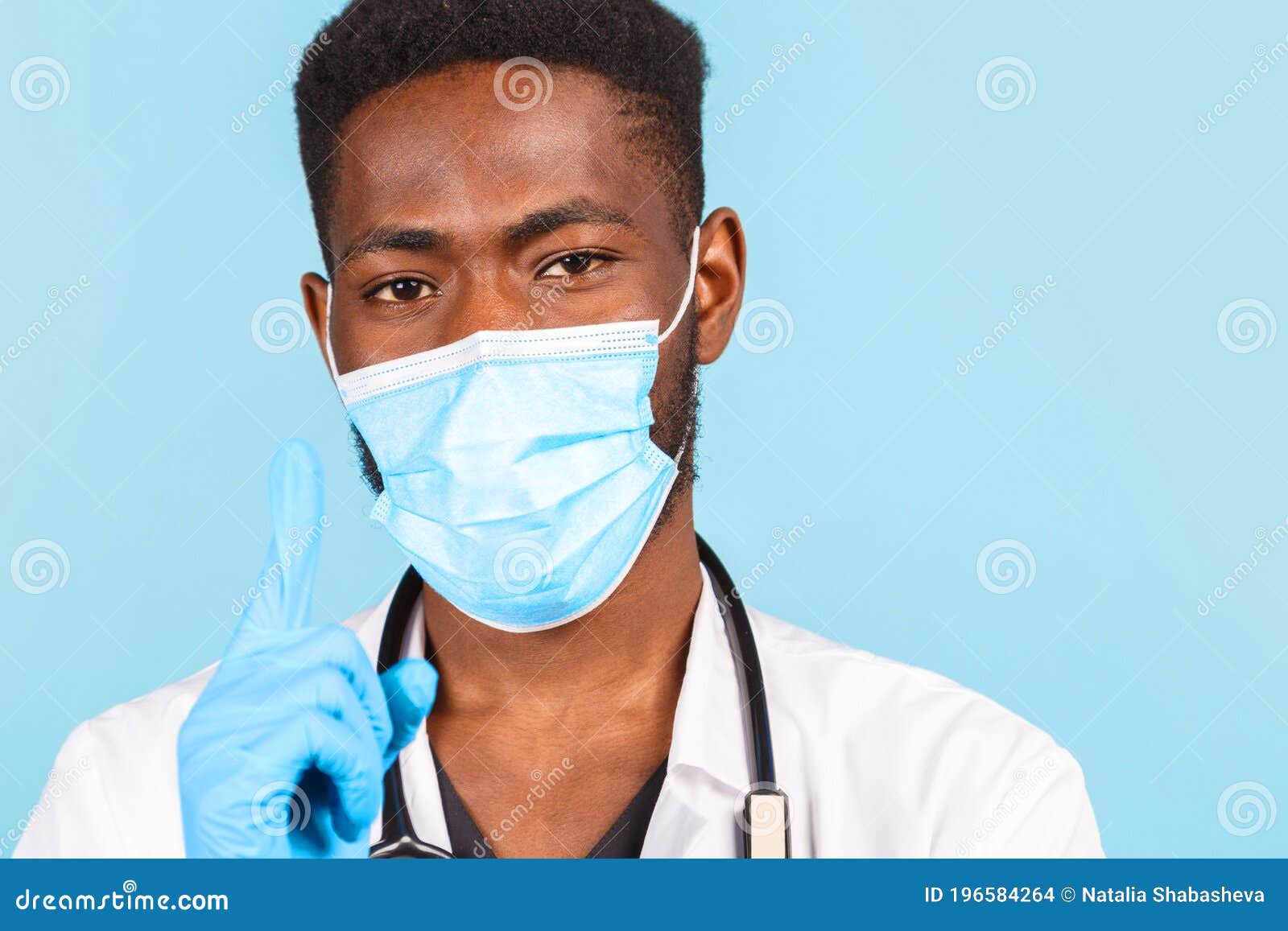 African American Male Doctor with Stethoscope Wearing Mask and Gloves ...