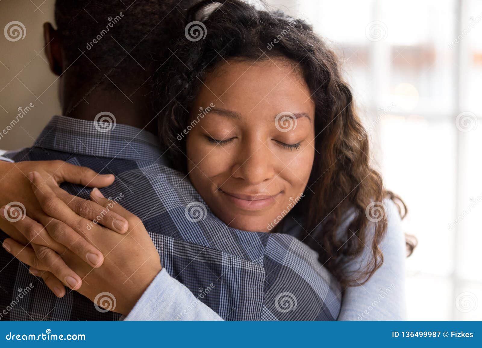 Happy African American Wife Hugging Husband Holding Tight Feelin ...