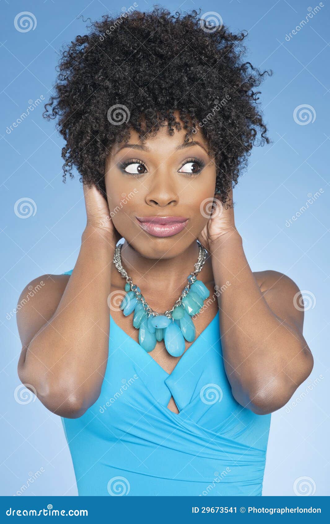 Happy African American Woman Covering Ears Over while Looking Away Colored  Background Stock Image - Image of ears, beauty: 29673541
