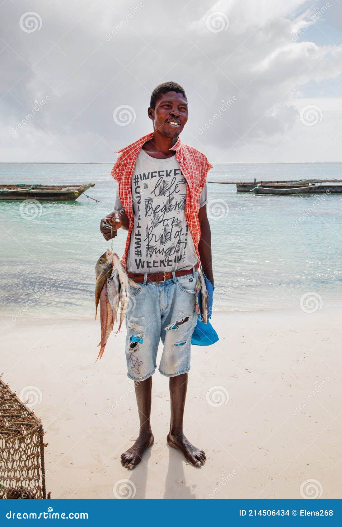 Happy African Fisherman with a Catch Stands by the Ocean Editorial Stock  Image - Image of makeshift, fish: 214506434