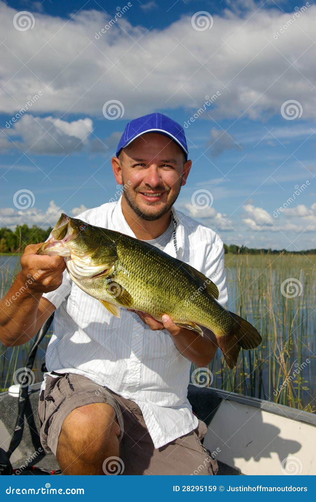 happy angler fishing for largemouth bass