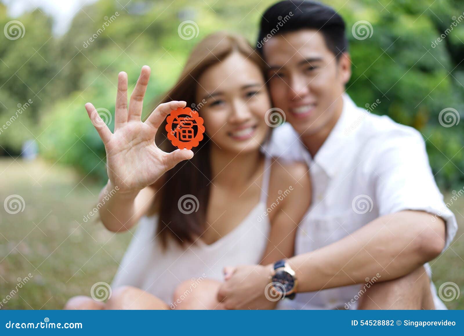 https://thumbs.dreamstime.com/z/happy-asian-couple-love-holding-symbol-happily-representing-good-luck-good-fortune-54528882.jpg