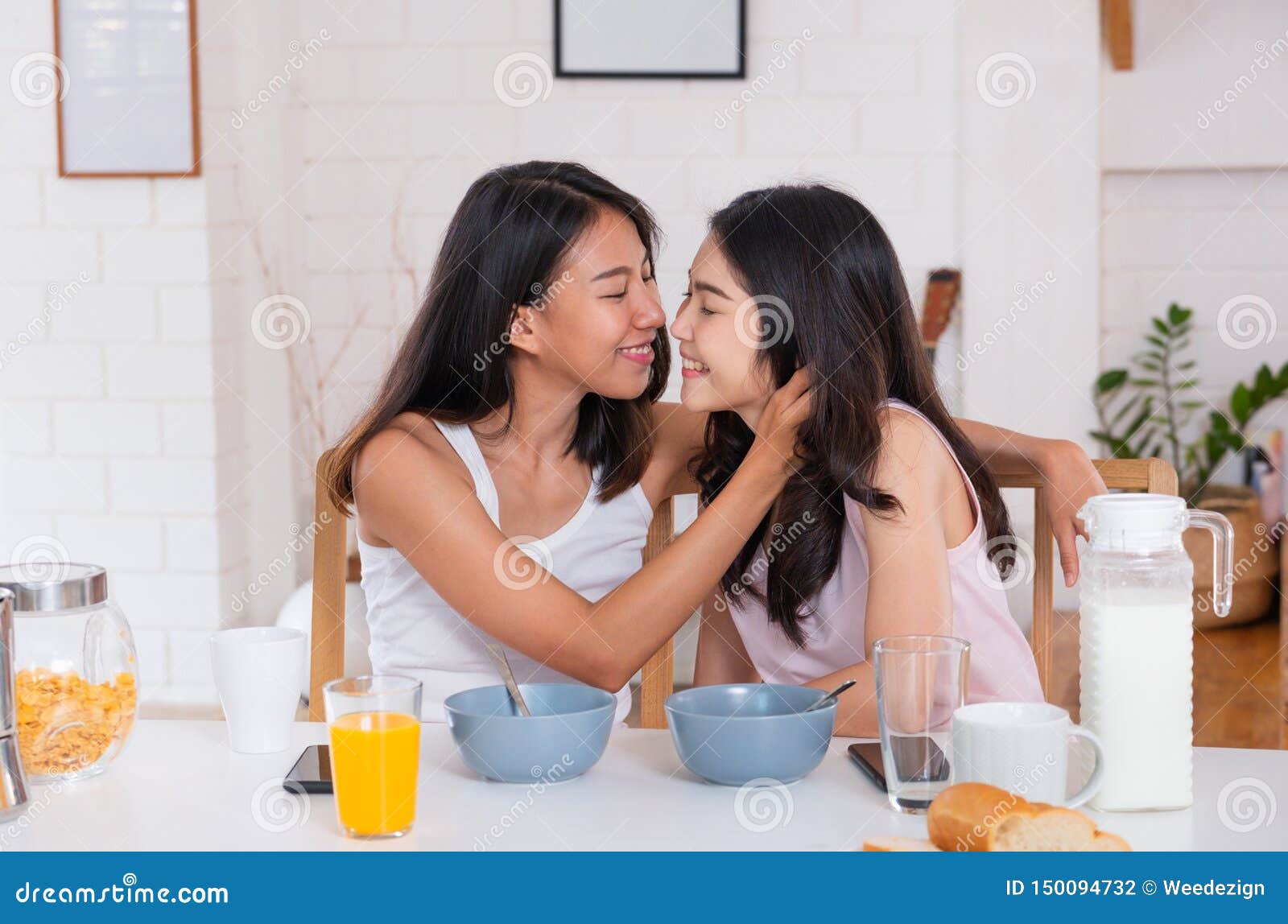 Happy Asian Lesbian Woman Couple Have Breakfast At House