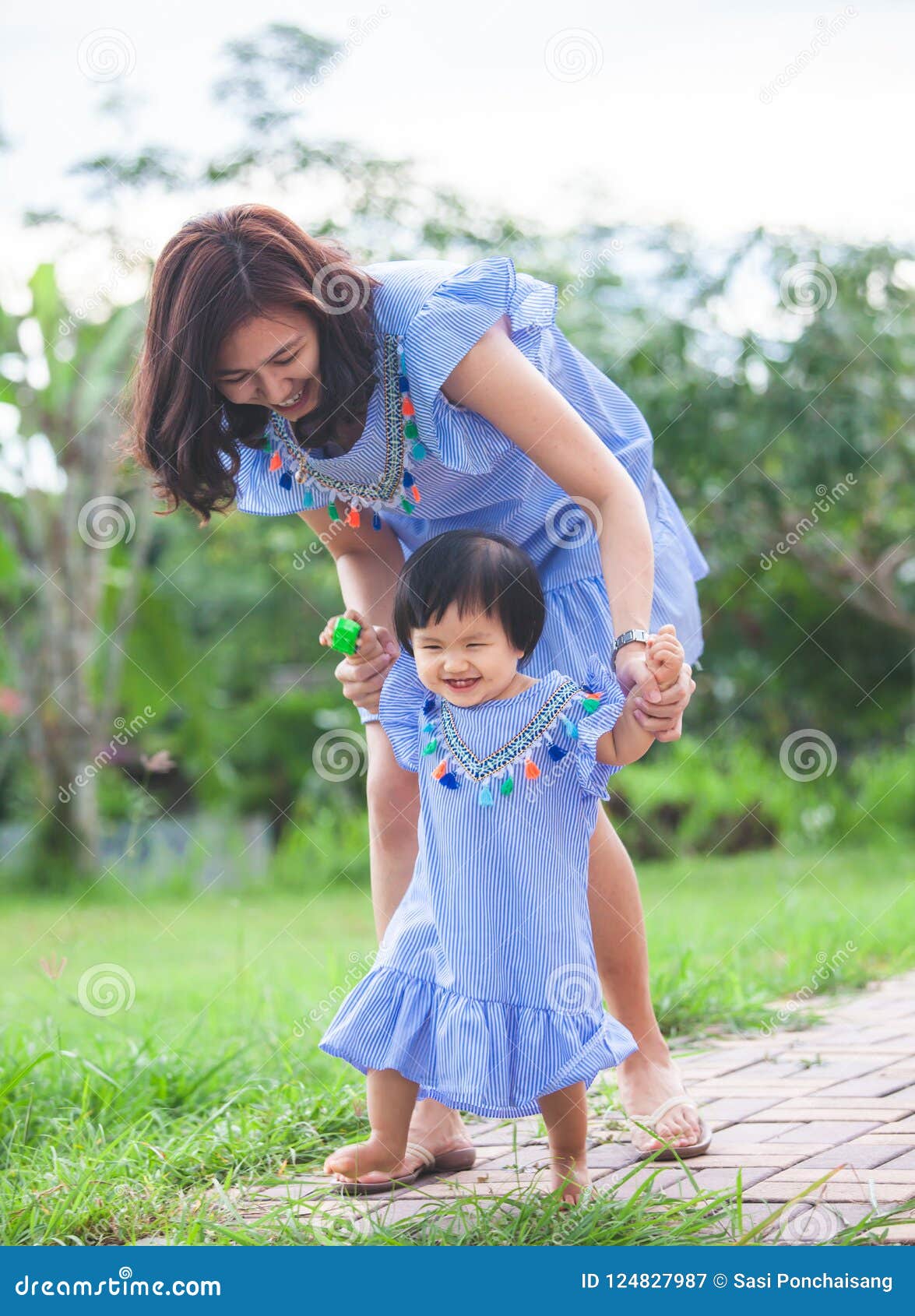 Happy Asian Mother and Cute Little Baby Girl Walking Together ...