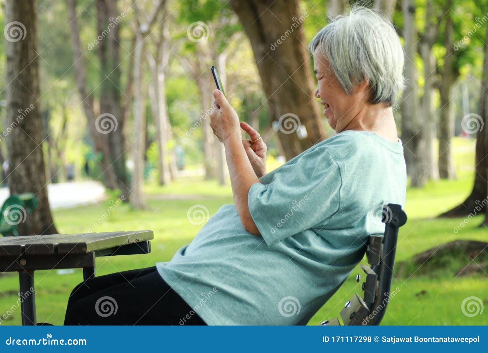 Happy Asian Senior Woman Using Mobile Phone Seriously Playing The Games On A Smart Phone Problem With Addicted To Online Game Of Stock Photo Image Of Laughing Lifestyle 171117298