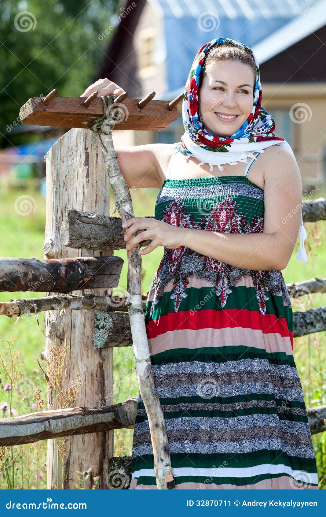 Happy Attractive Country Girl in Sundress and Headscarf Against House ...