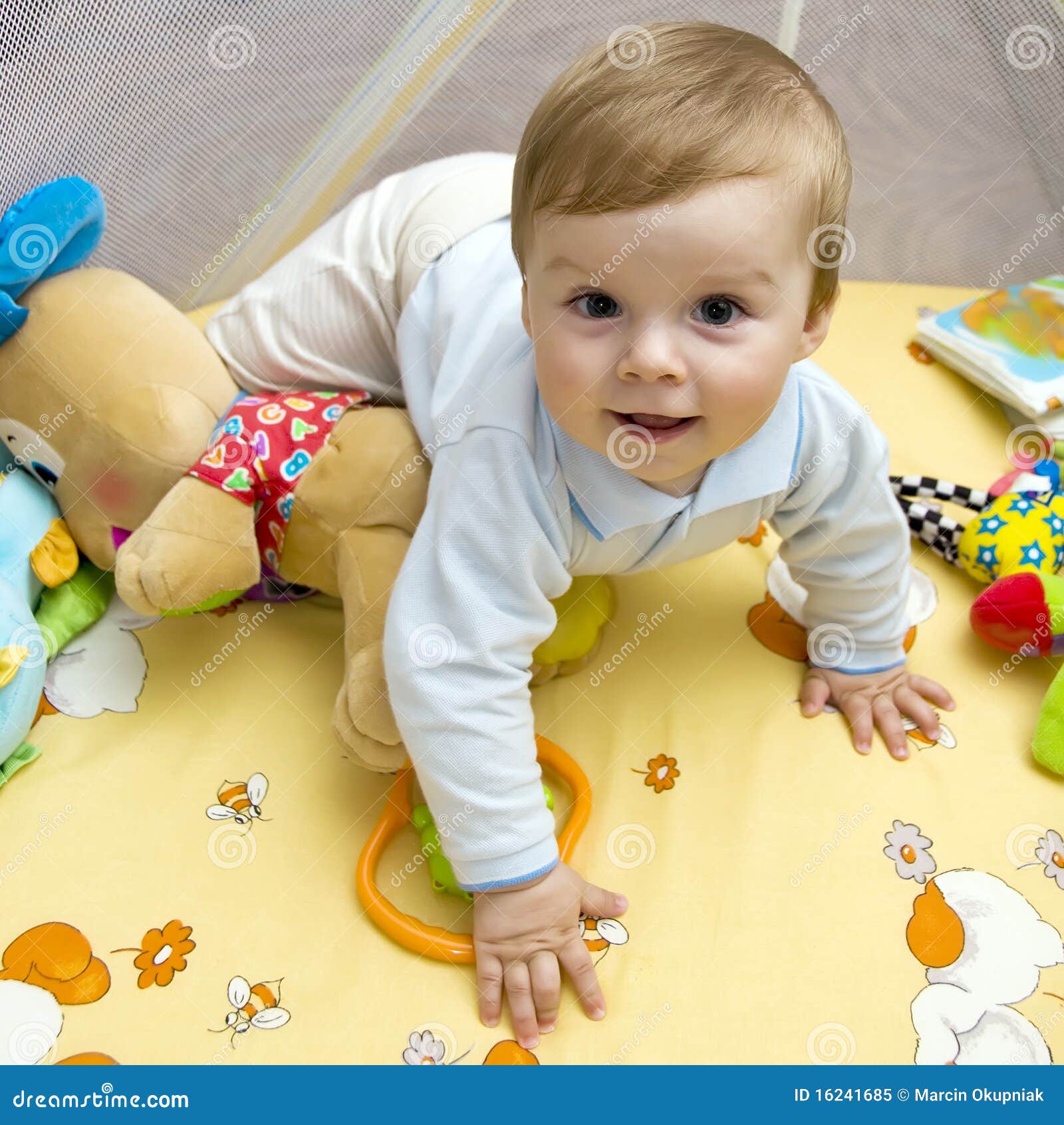 happy baby on bed