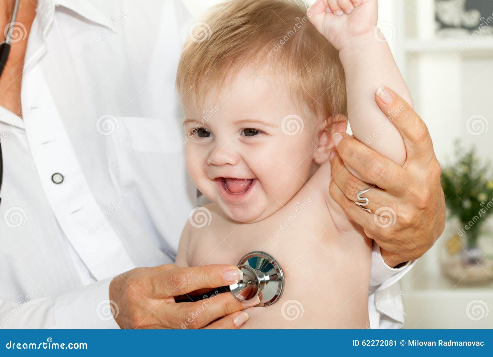 Happy baby at doctor stock image. Image of cheerful, female 62272081