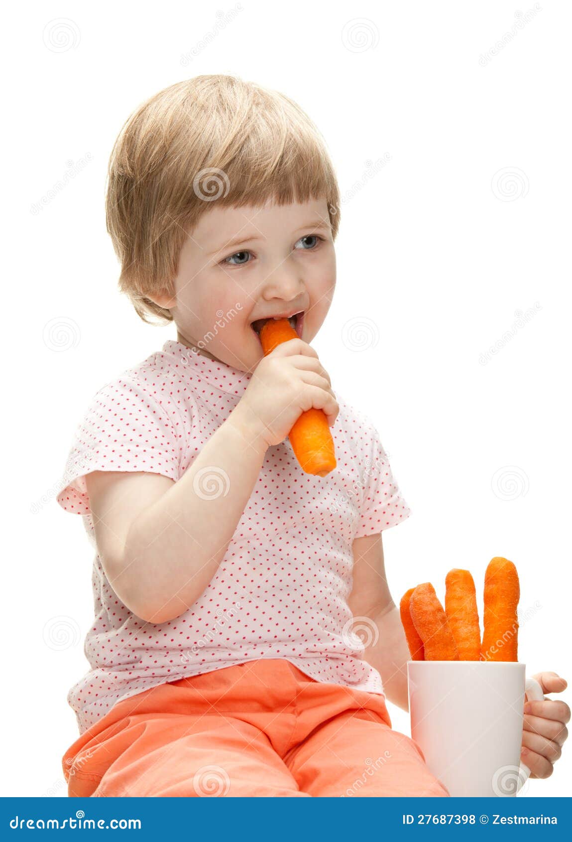 Happy Baby Eating Fresh Carrot Stock Photo Image of hand, health 27687398