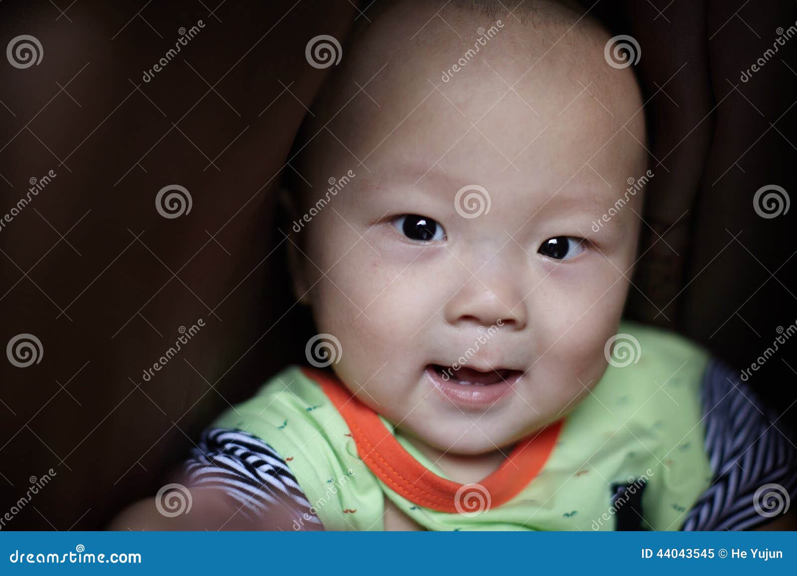 Happy baby face closeup stock image. Image of leaf, dark - 44043545