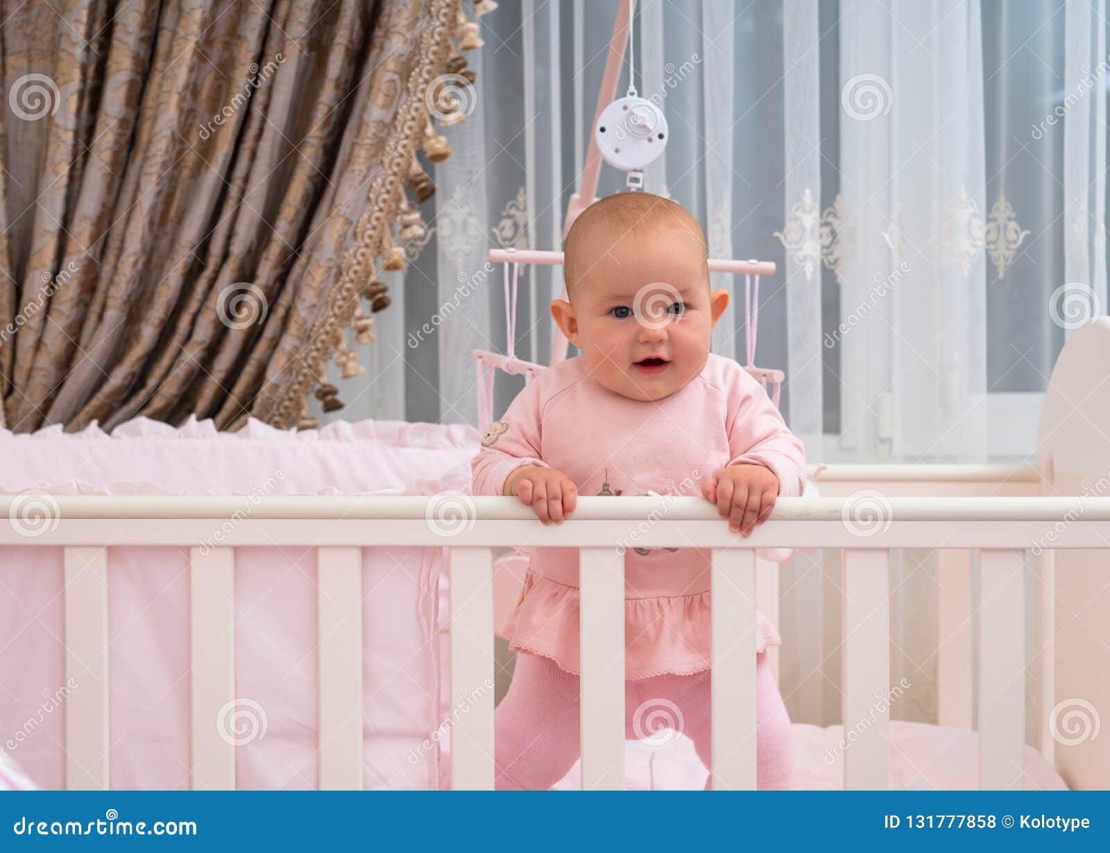 baby girl in crib
