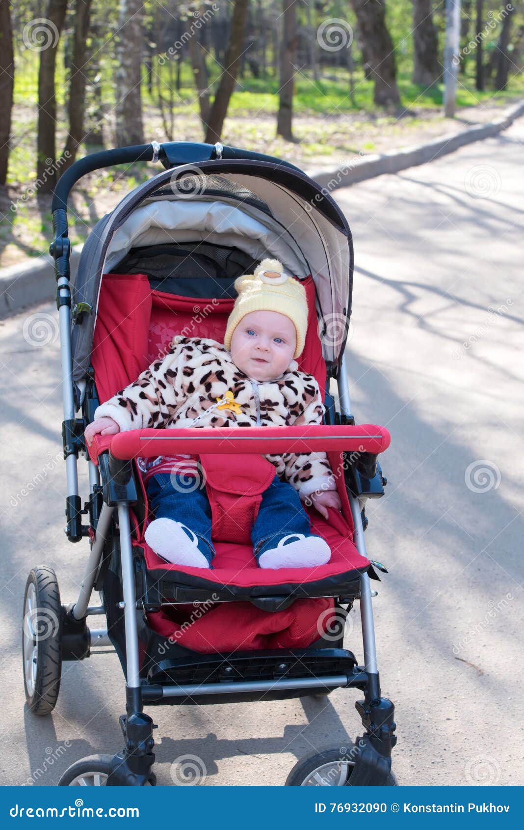 Happy Baby Sitting in Stroller Stock Photo - Image of beautiful: 76932090