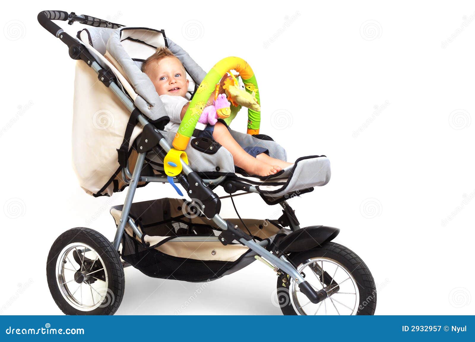 Happy baby in stroller stock image. of childhood - 2932957