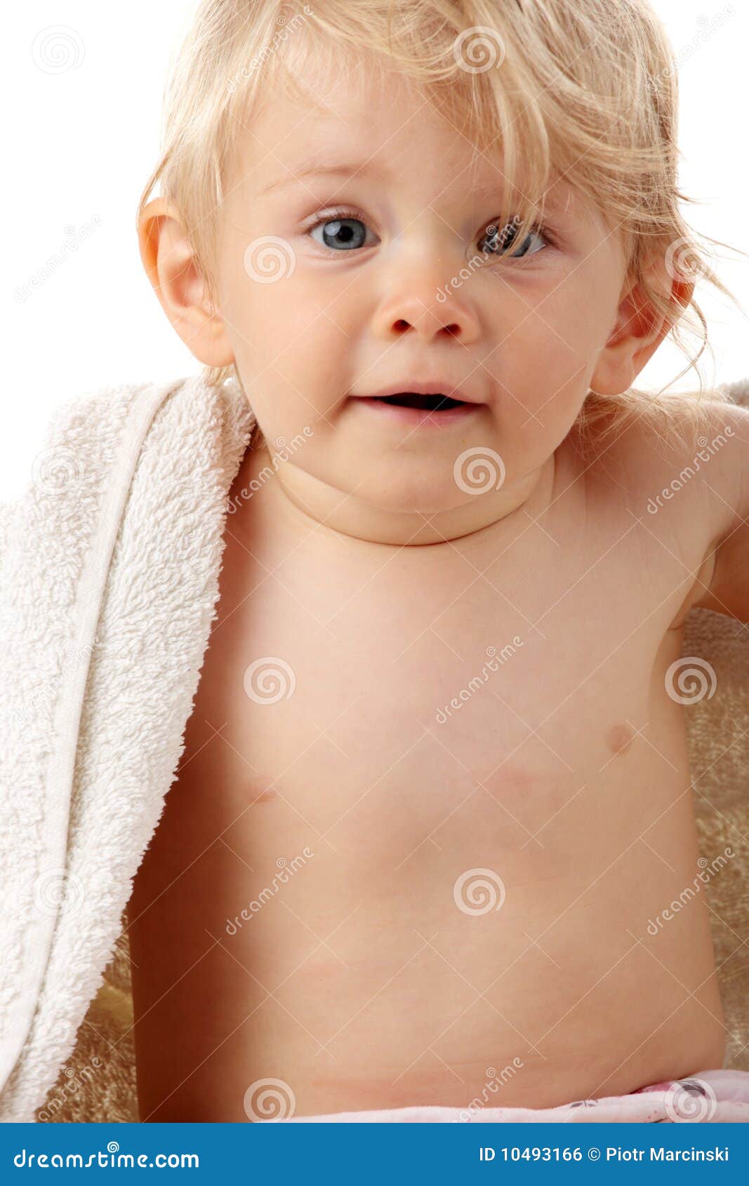 Happy baby with towel stock photo. Image of closeup, mouth 10493166