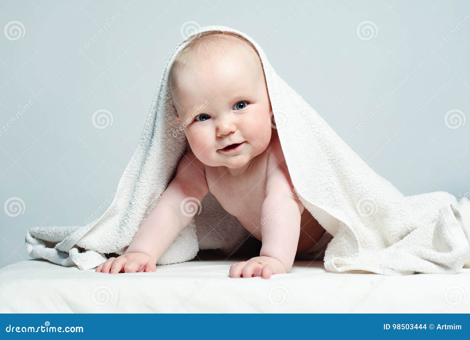Happy Baby In White Towel On Background Stock Photo Image Of