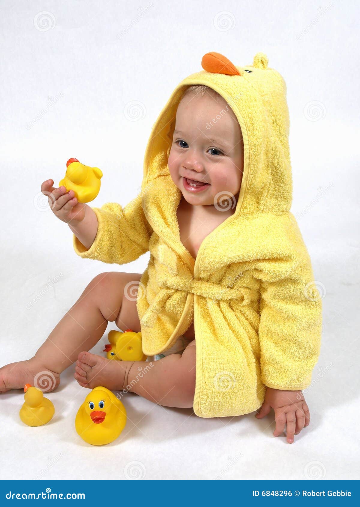 Happy Baby In Yellow Duck Robe Stock Photo - Image of ...