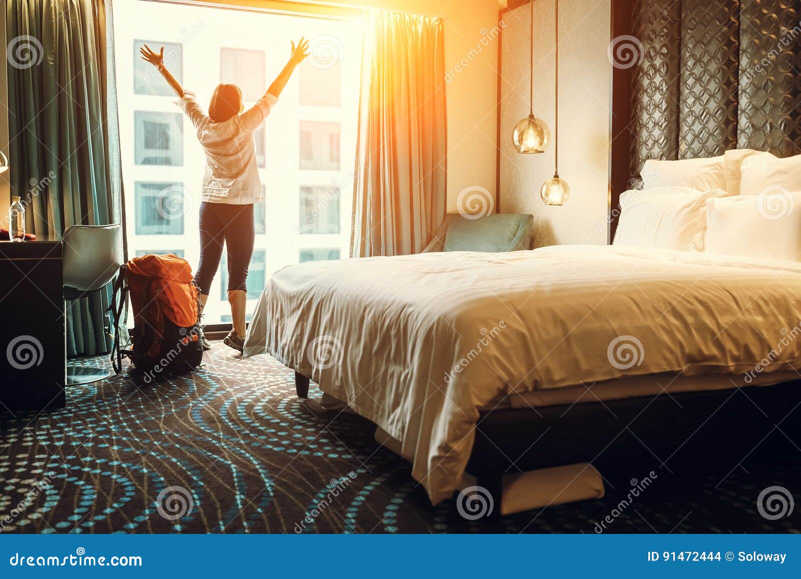 happy backpacker traveller stay in high quality hotel