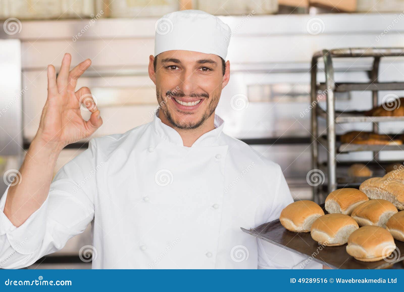 Happy Baker Showing Tray of Fresh Bread Stock Photo Image of