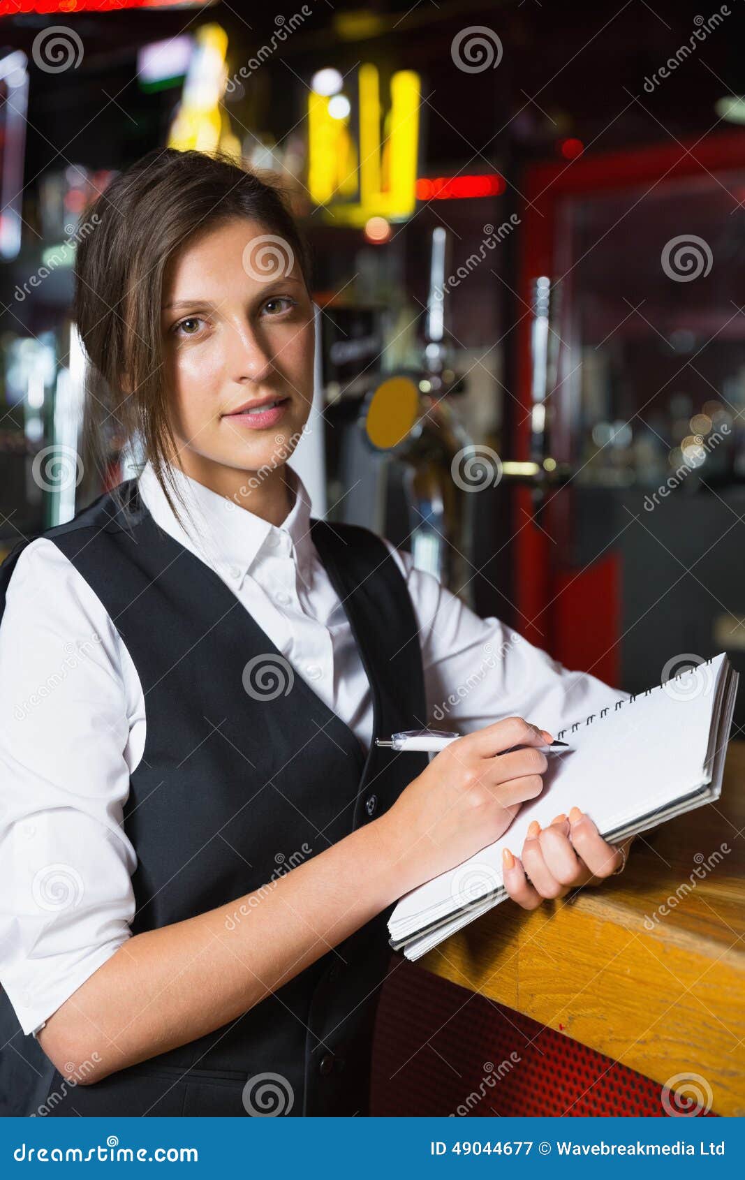 Happy Barmaid Writing in Notepad Stock Image Image of beautiful