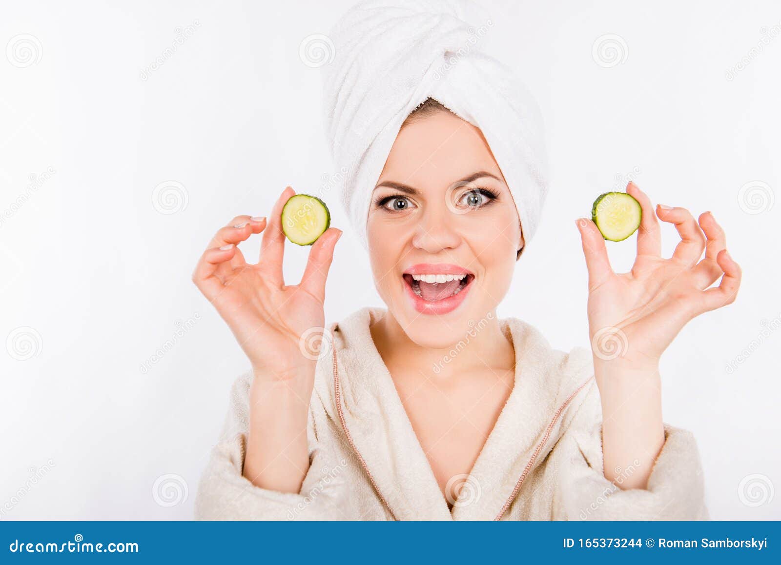 Happy Beautiful Girl Holding Cucumber Slices Near the Face Stock Photo ...