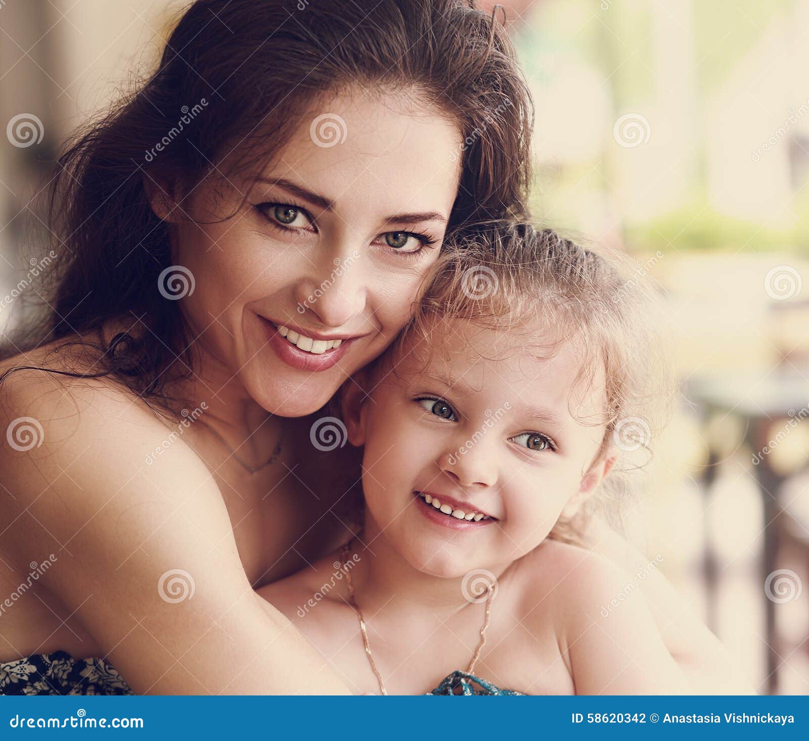 2074 Beautiful Smiling Mother Small Happy Daughter Cuddling Stock 
