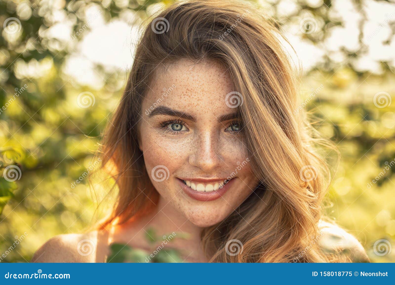 Happy Girl With Freckles Posing In Sunny Garden Stock Image - Image of ...