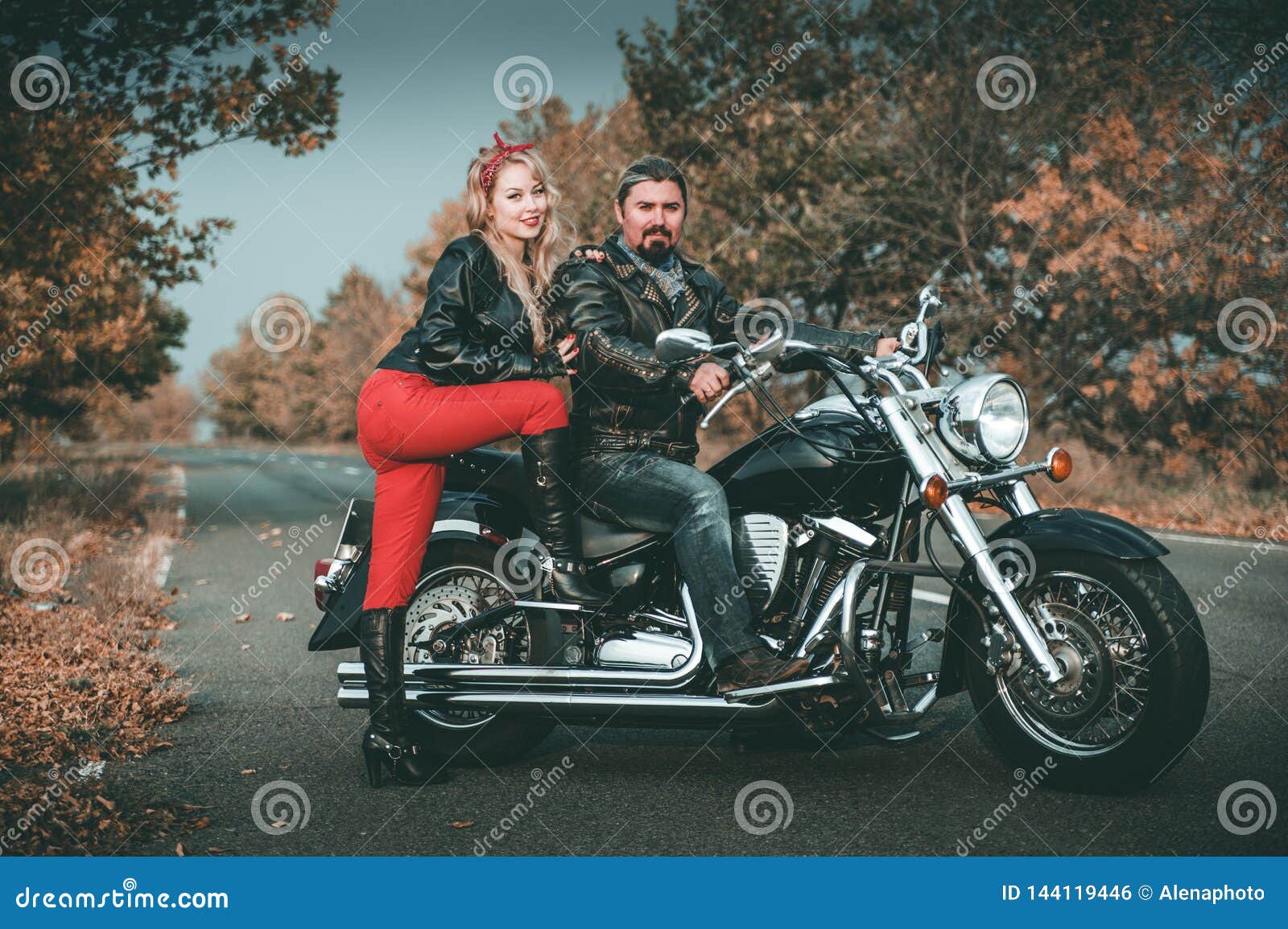 Happy Bikers Posing with Motorcycle. Stock Photo Image of caucasian