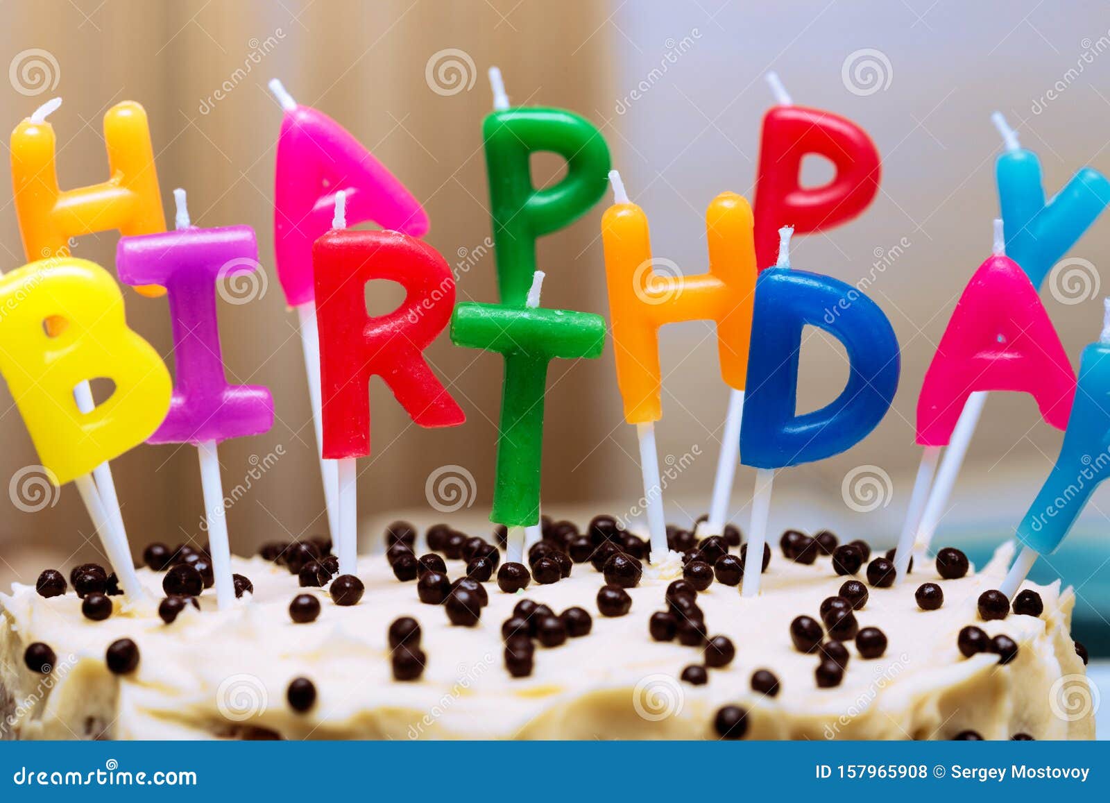 Happy Birthday Candles on a Birthday Cake Stock Photo Image of cake
