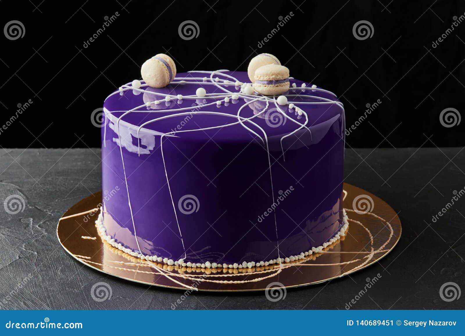 Happy Birthday Multi Layer Cake. with Purple Icing and Macaroons Stock